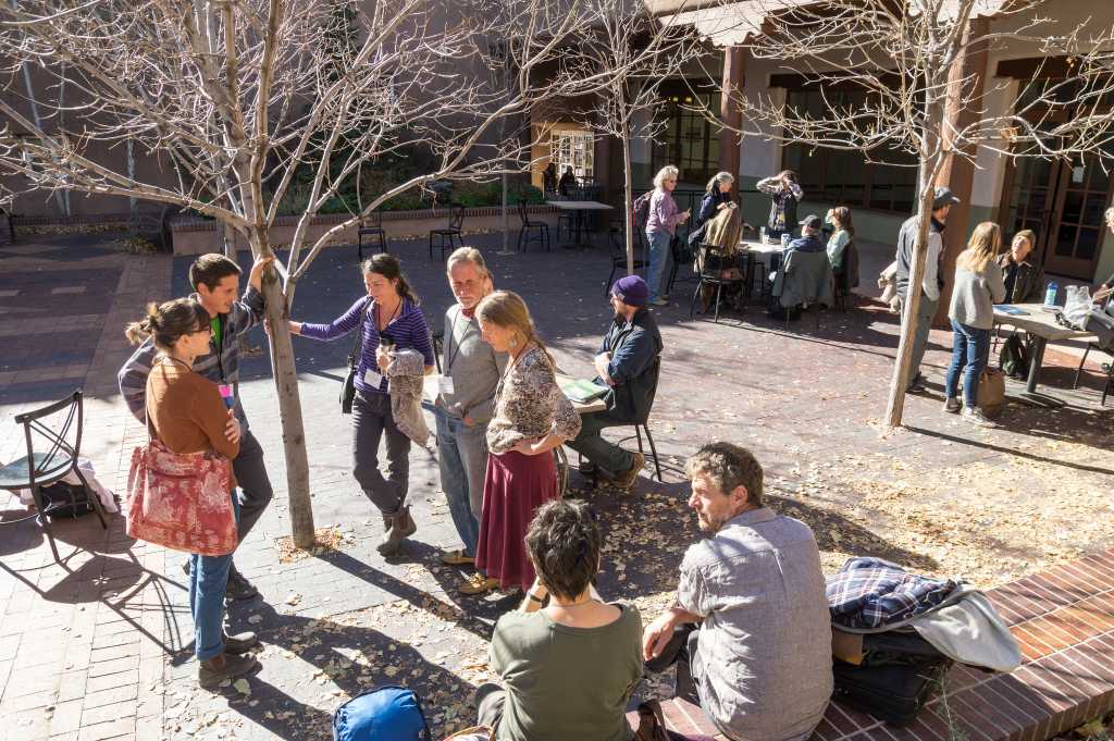 Enjoying sunshine and conversation in the courtyard