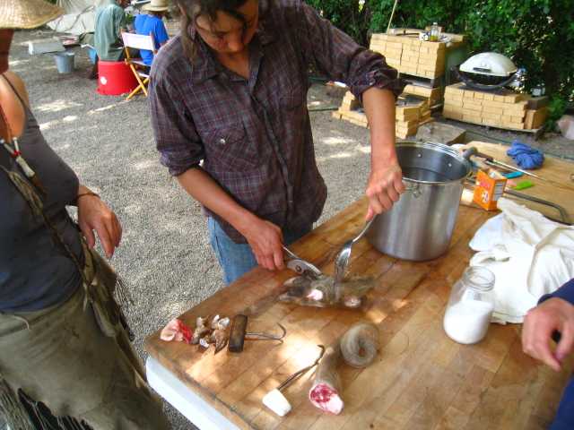 Scalding hoofs and pulling outer ‘nails’ which can be dried and used as a rattle