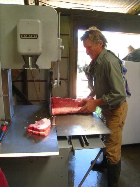 Cutting pork chops by machine
